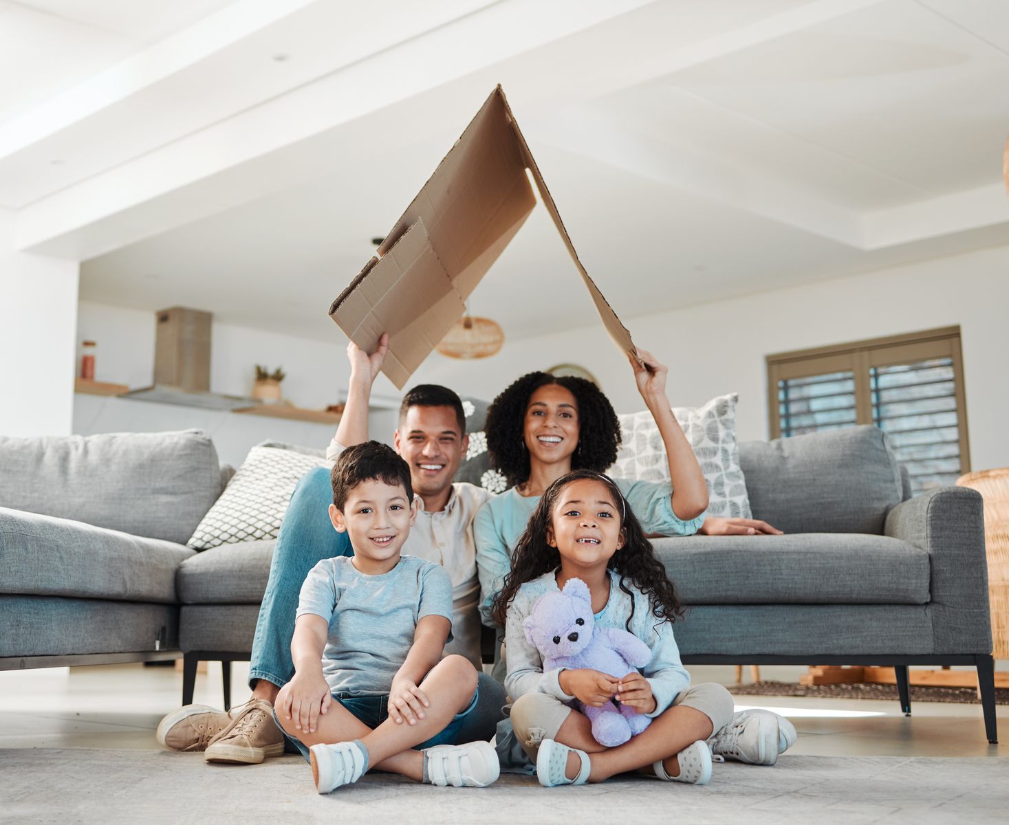 family-plays-together-under-cardboard-roof-in-livi-2026-03-25-03-29-30-utc.jpg